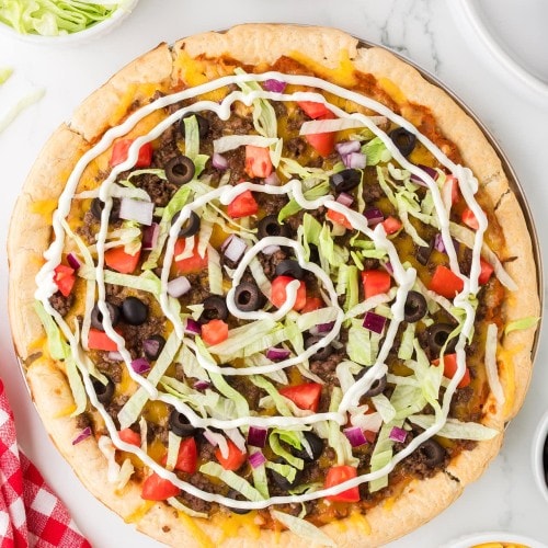 Topdown view of a freshly baked Taco Pizza.