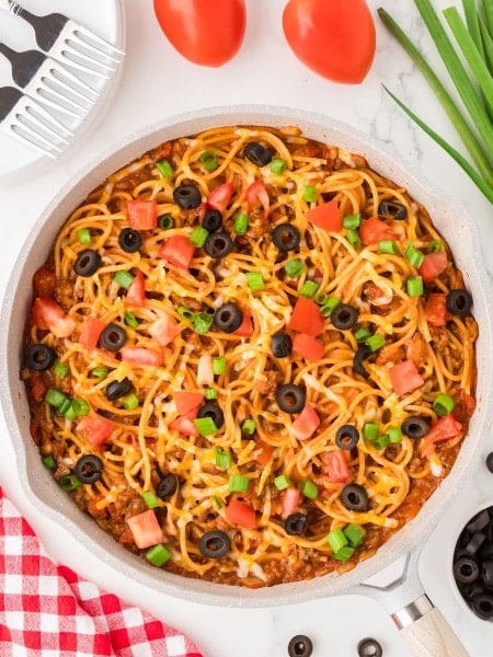 Top down view of a skillet with one pot Taco Spaghetti.