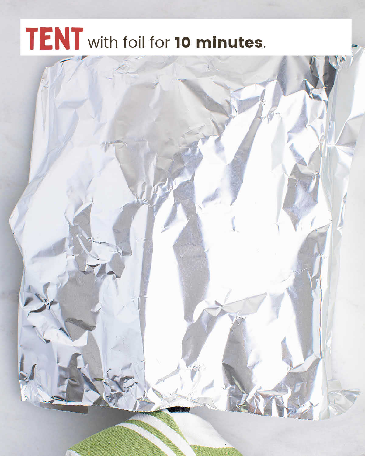 Foil covering a tri-tip steak.
