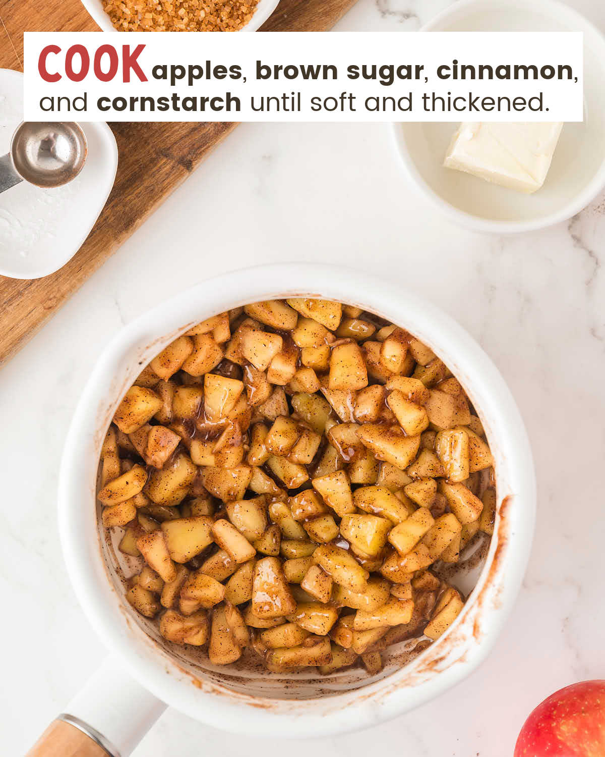 Apples, brown sugar, cinnamon, and cornstarch in a sauce pan.