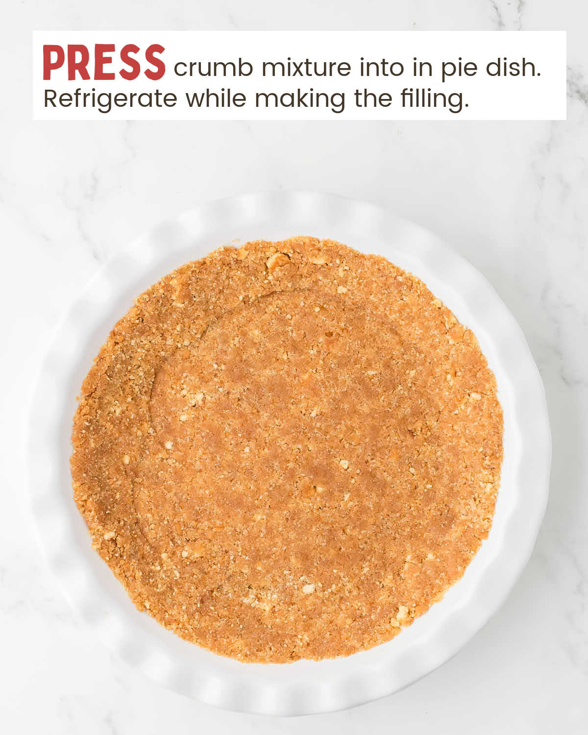 Vanilla wafer crumb mixture pressed into a pie plate.