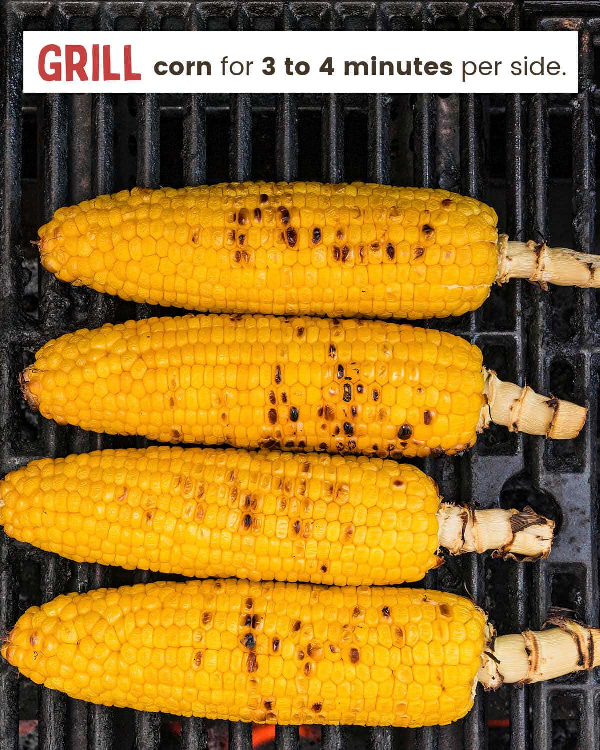 Four ears of corn on a grill.