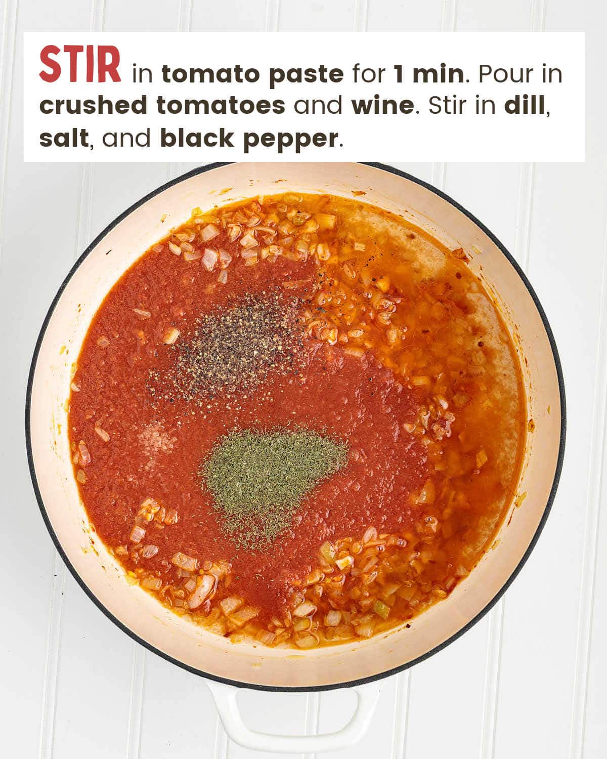 Red sauce and spices in a skillet.