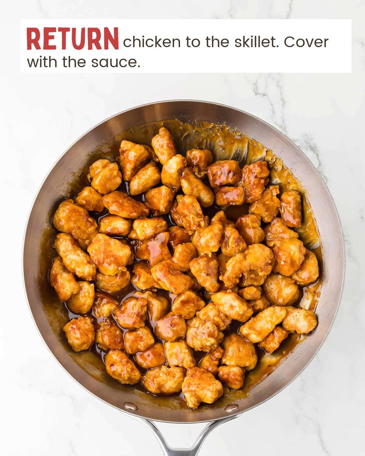 Orange chicken in a skillet.