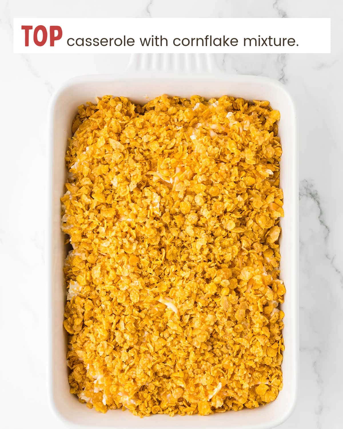 A casserole topped with a cornflake mixture.