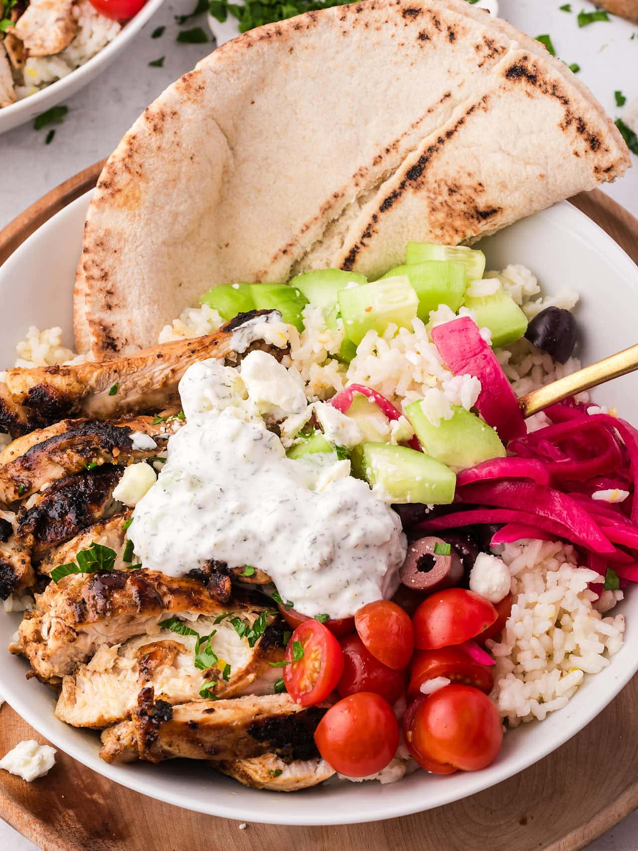 Closeup of a Greek Chicken Bowls.