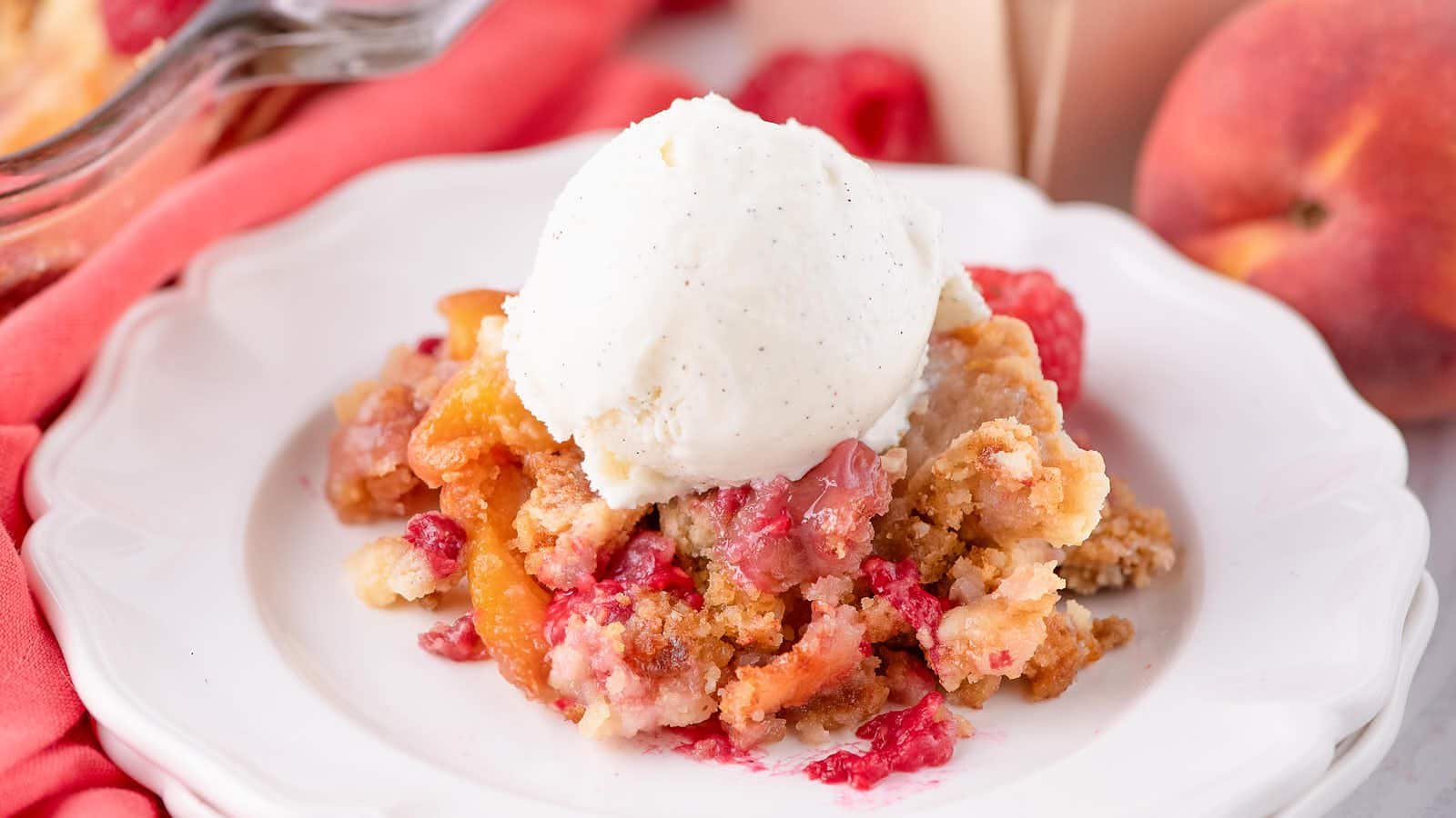 Peach Melba Dump Cake recipe by Cheerful Cook.