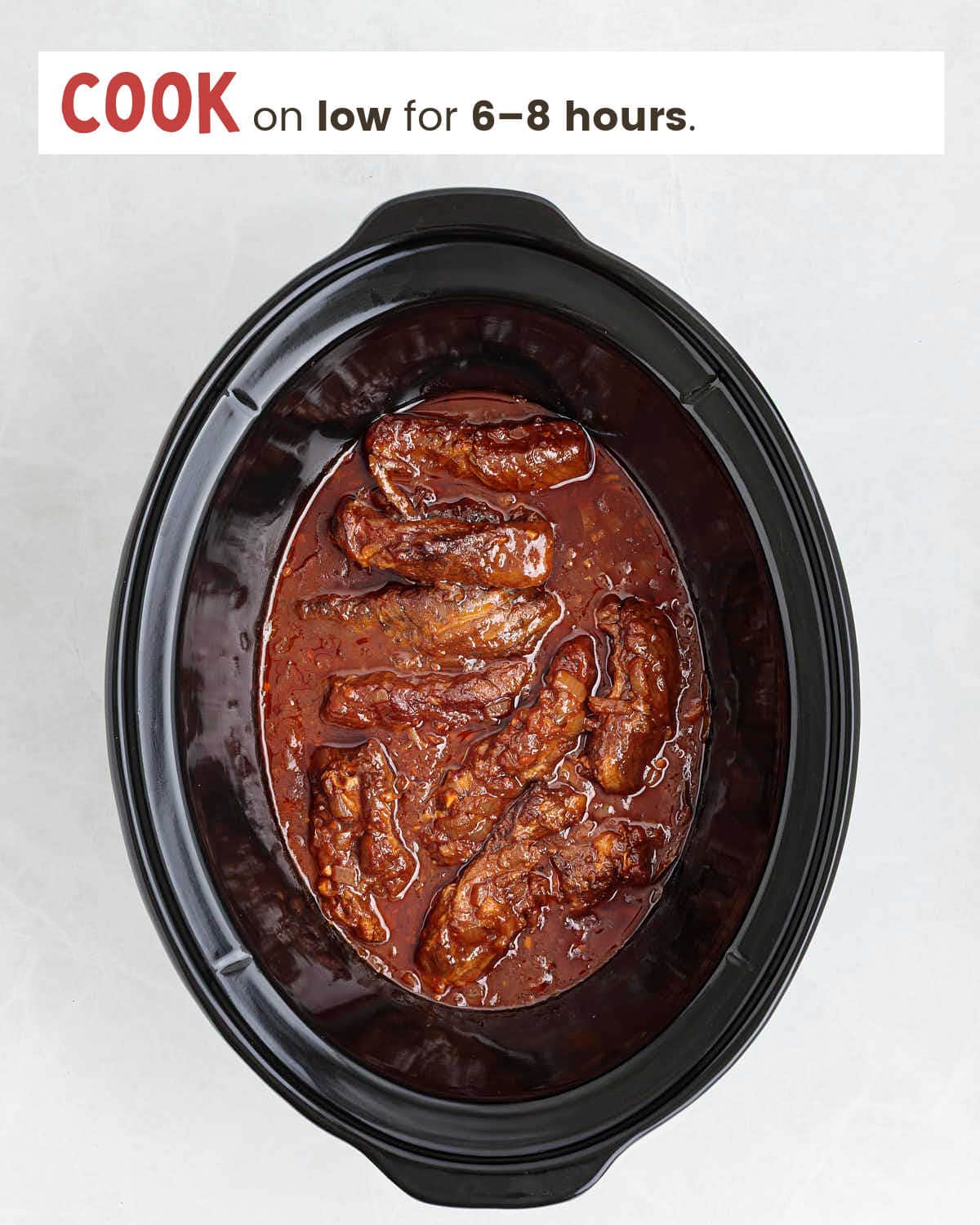 Beef ribs in a slow cooker.