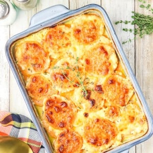 Topdown view of Potato Gratin in a blue casserole dish.