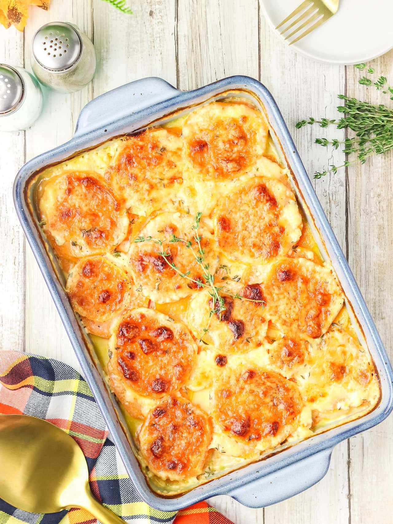 Topdown view of Potato Gratin in a blue casserole dish.