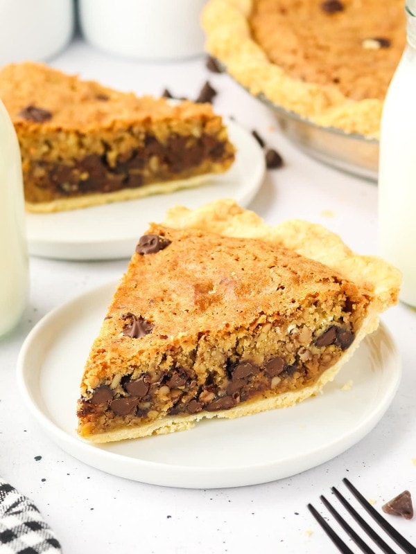 A slice of Cookie Pie served on a white plate.