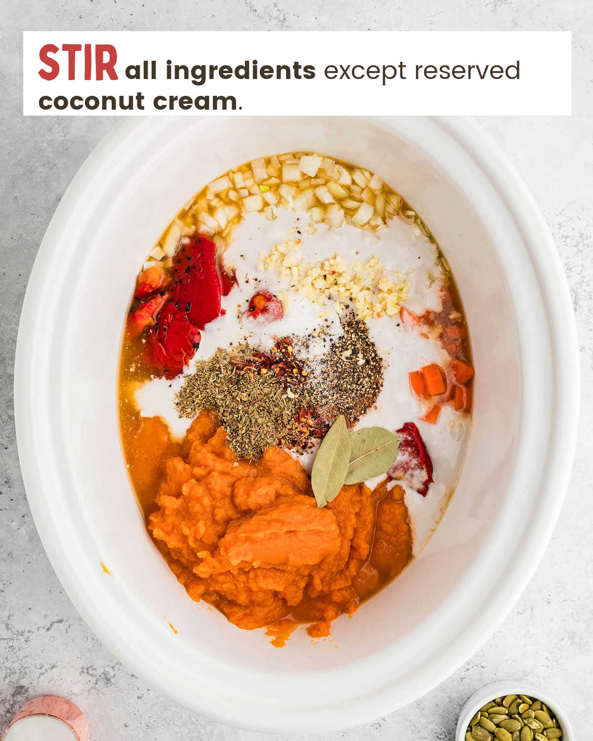 Pumpkin soup ingredients in a crockpot. 