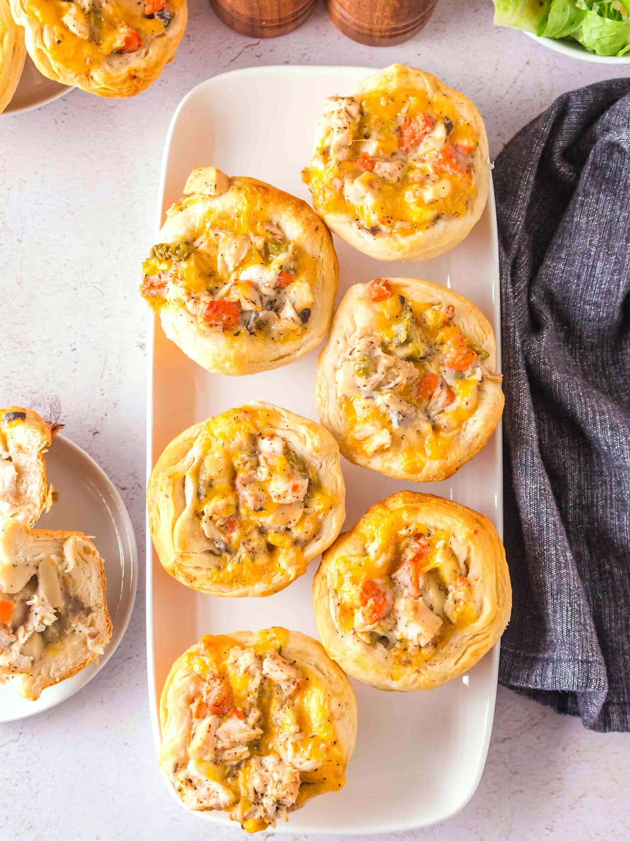 Mini Chicken Pot Pies on a white serving platter.