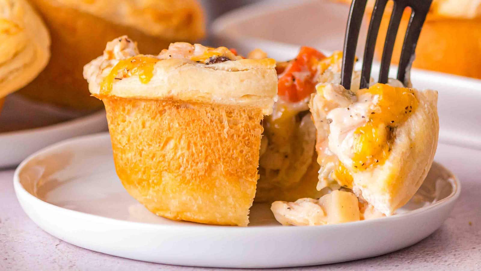 Mini Chicken Pot Pies recipe by Cheerful Cook.
