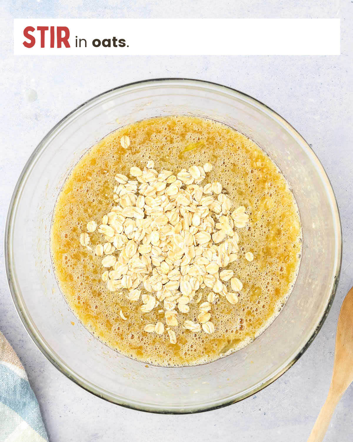 Pie filling for oatmeal pie topped with rolled oats in a bowl.
