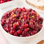 Closeup of homemade Cranberry Sauce served in a white bowl.