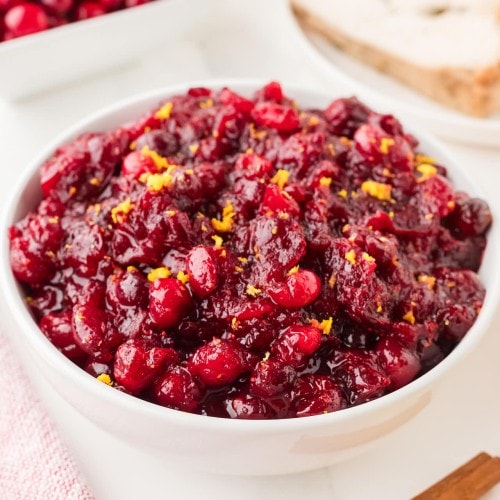 Closeup of homemade Cranberry Sauce served in a white bowl.