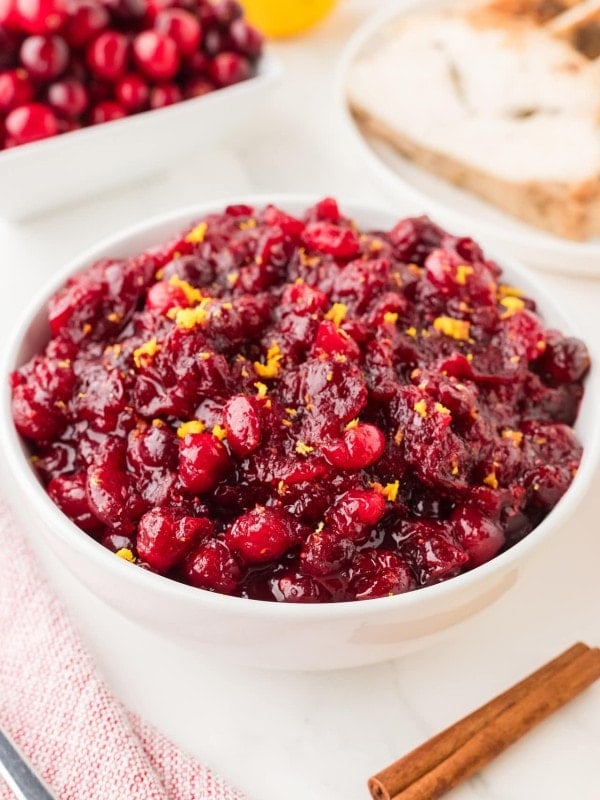 Closeup of homemade Cranberry Sauce served in a white bowl.