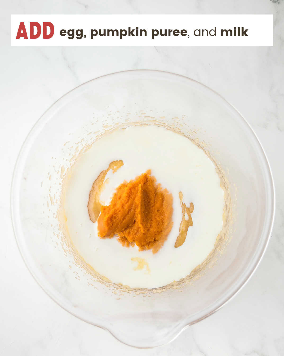 Adding wet ingredients into the batter.