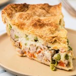 A slice of Turkey Pot Pie on a plate.