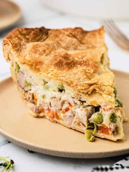 A slice of Turkey Pot Pie on a plate.