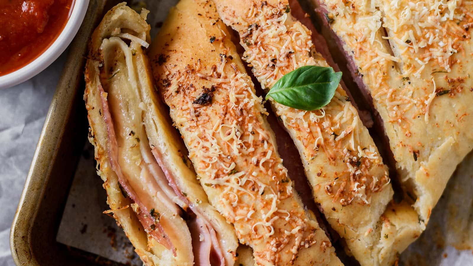 Easy Stromboli served with marinara sauce.