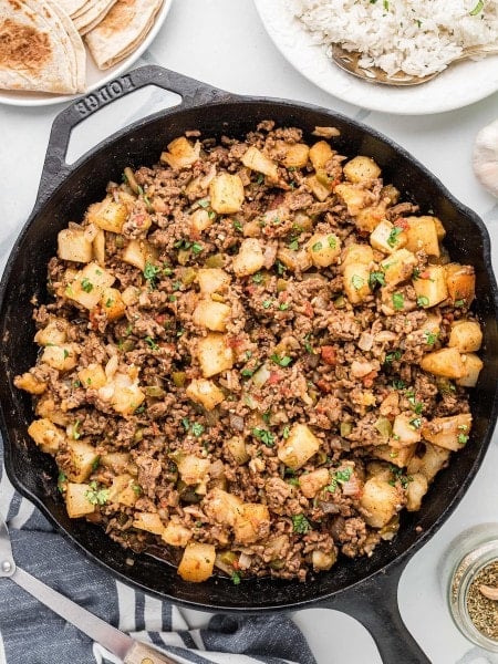 Classic Picadillo in a cast iron skillet.