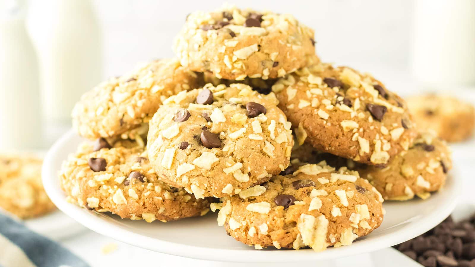 Potato Chip Cookies piled high on a white plate.