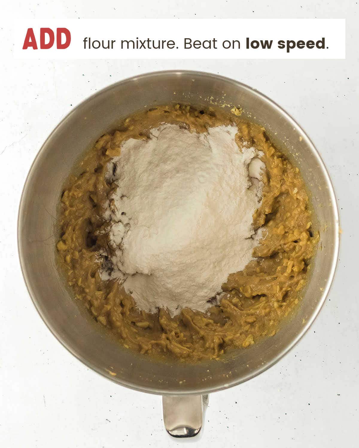 Add flour mixture to the stand mixer.