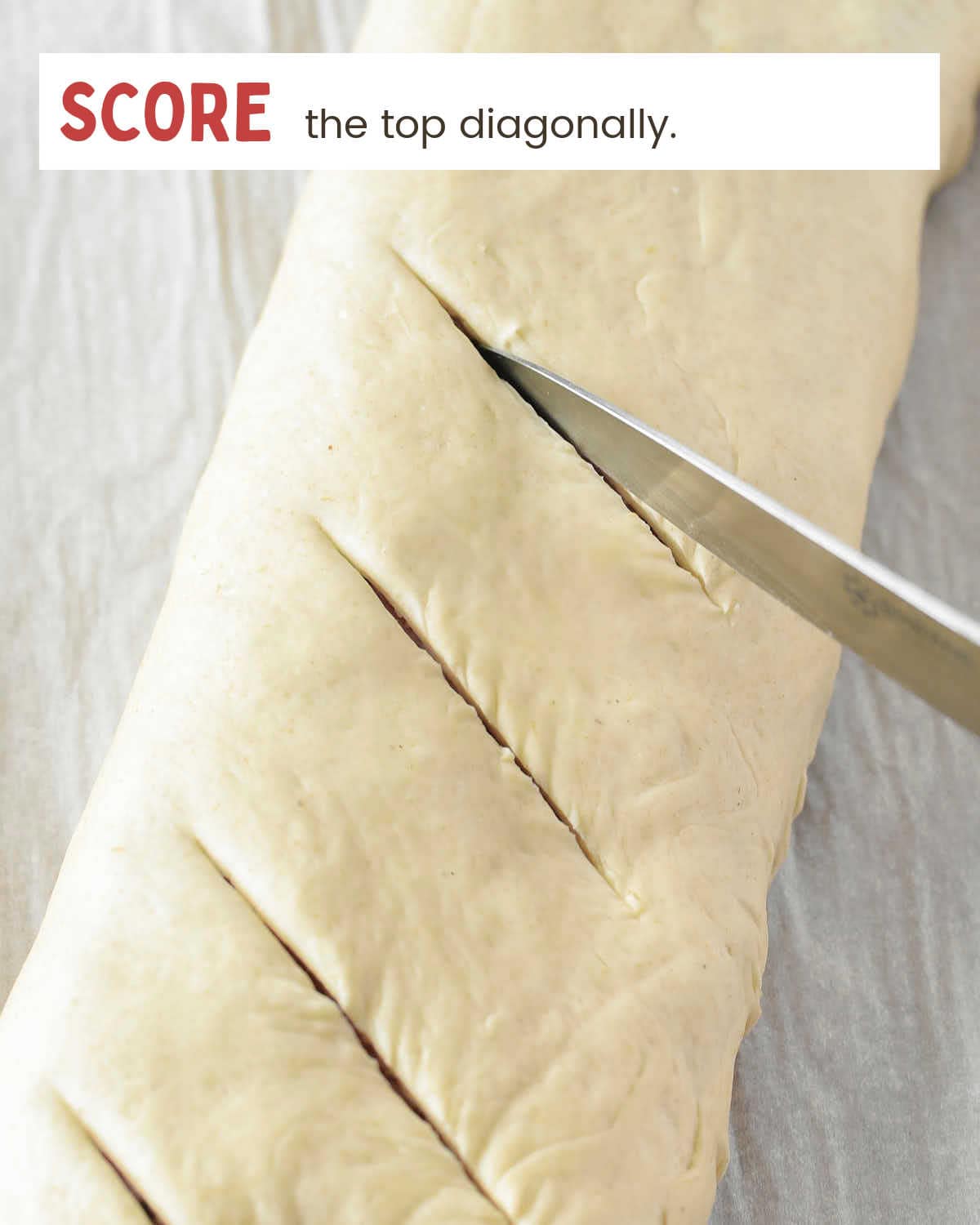 Score pizza dough log.