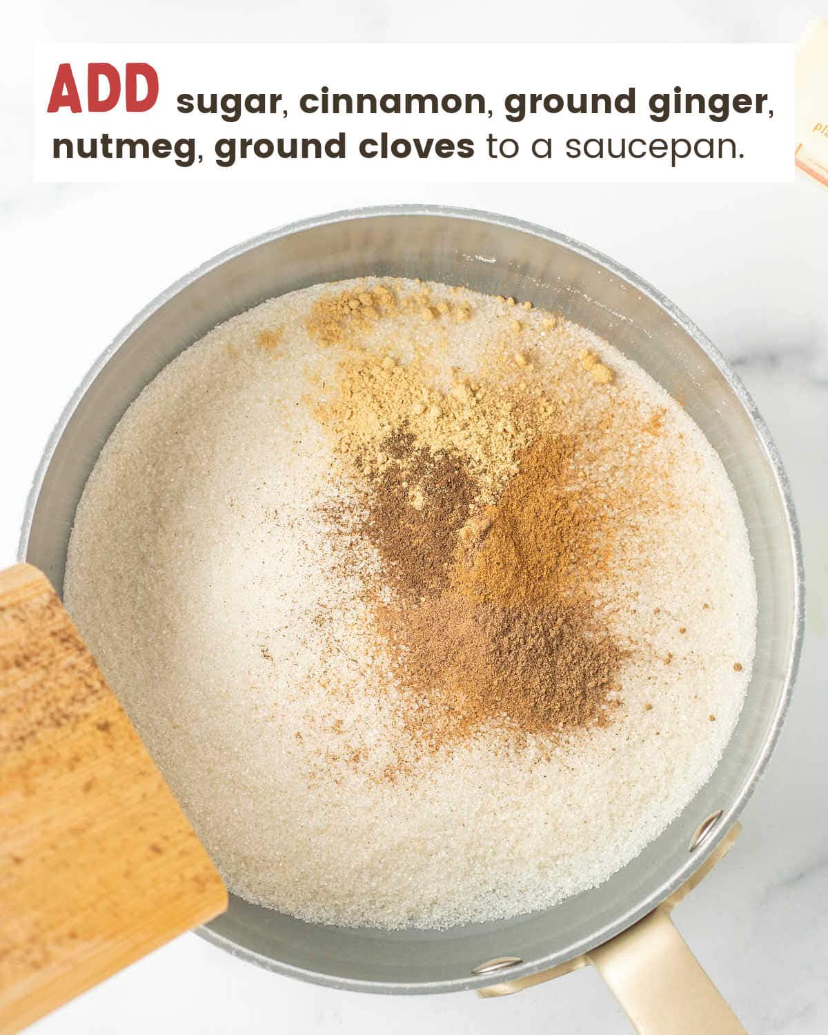 Combine sugar and spices in a saucepan.