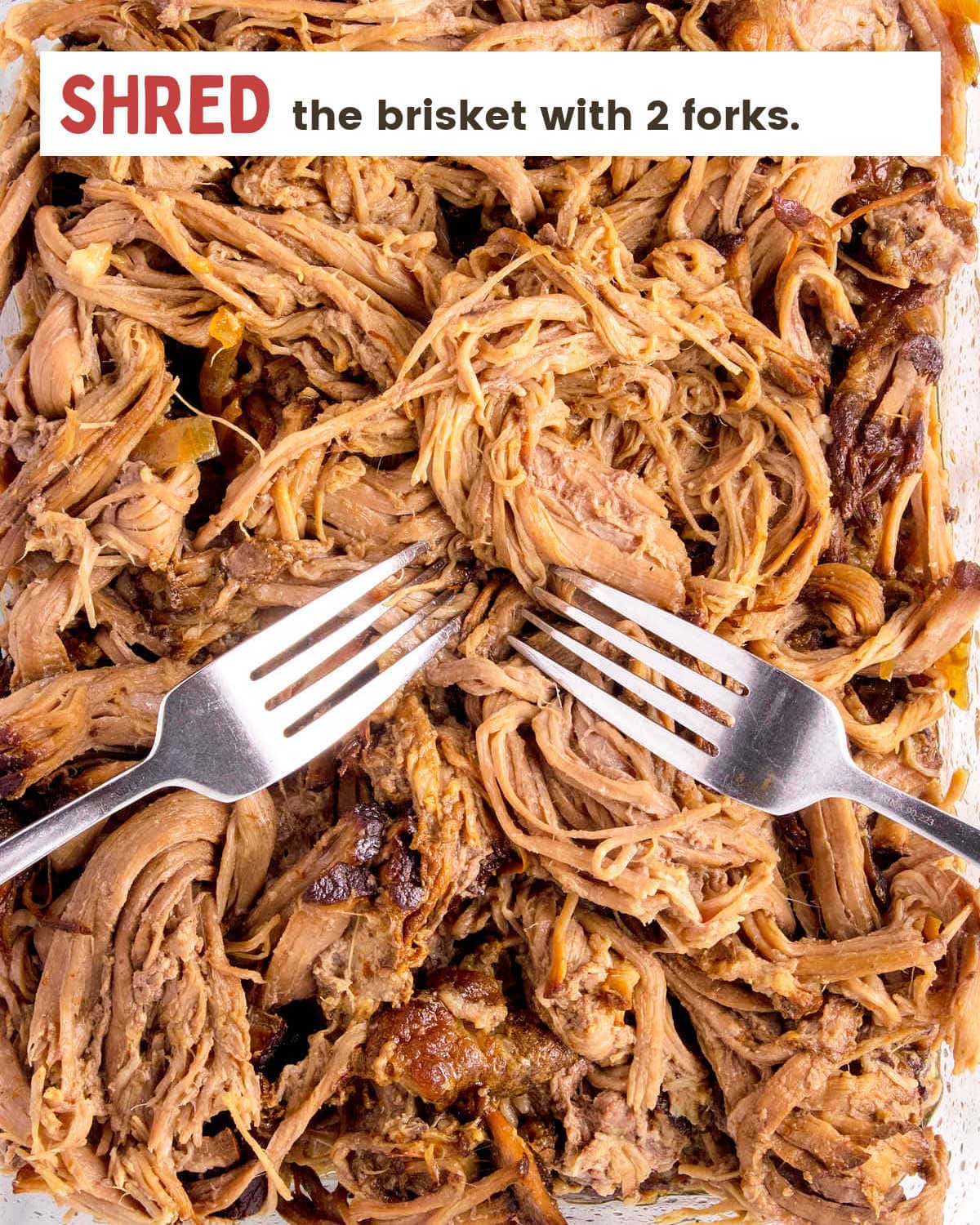 Slice the brisket with 2 forks.