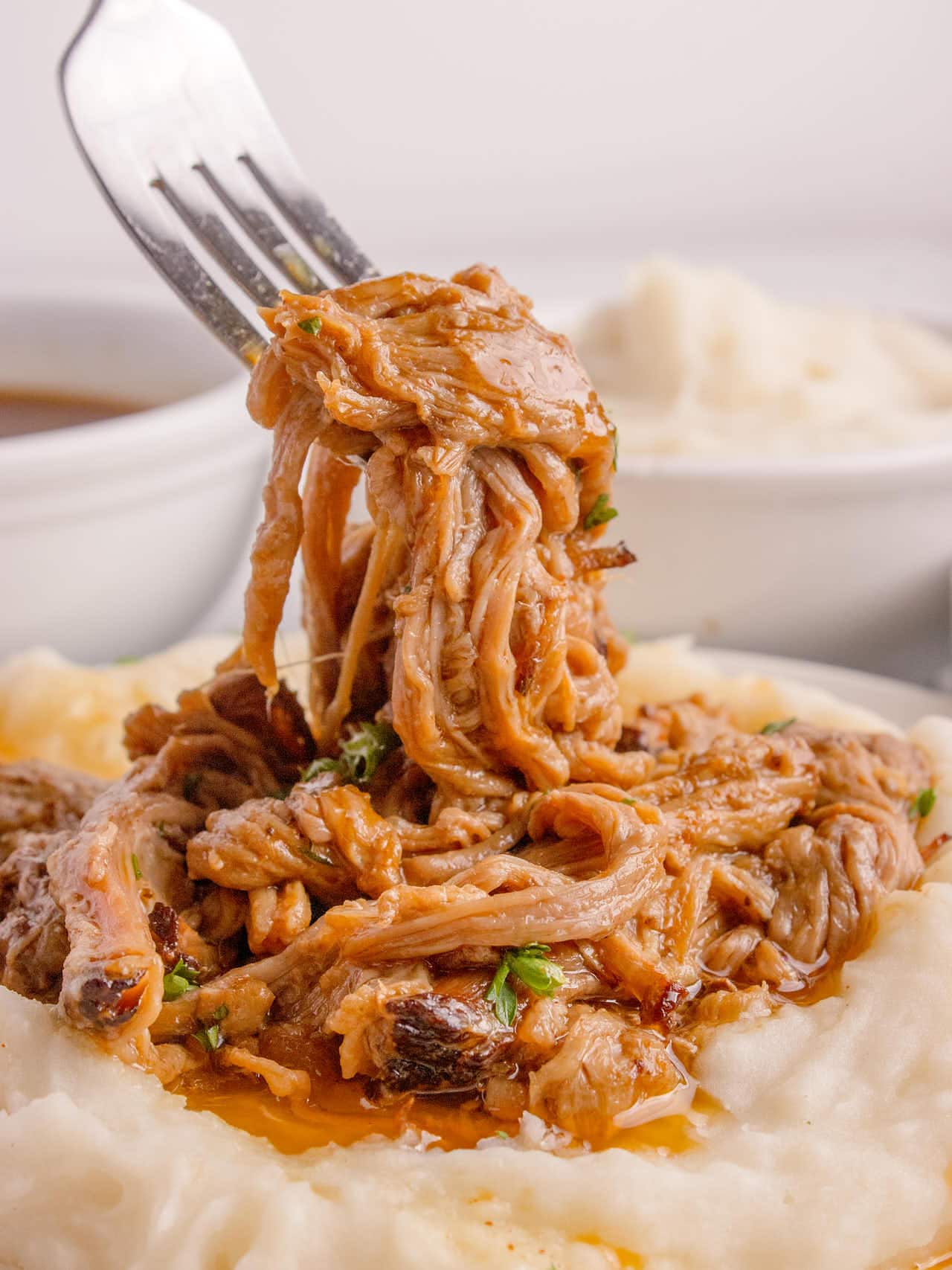 Closeup of a forkful of brisket.