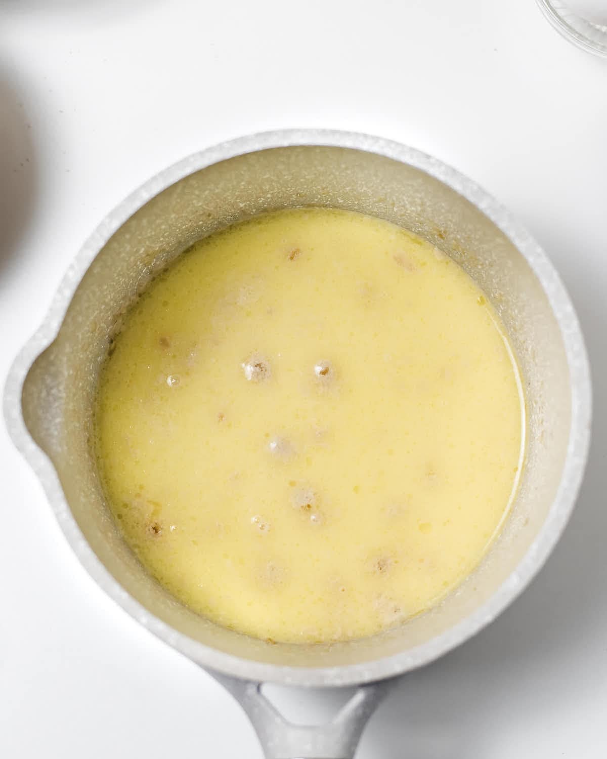 Melted butter in a medium saucepan.