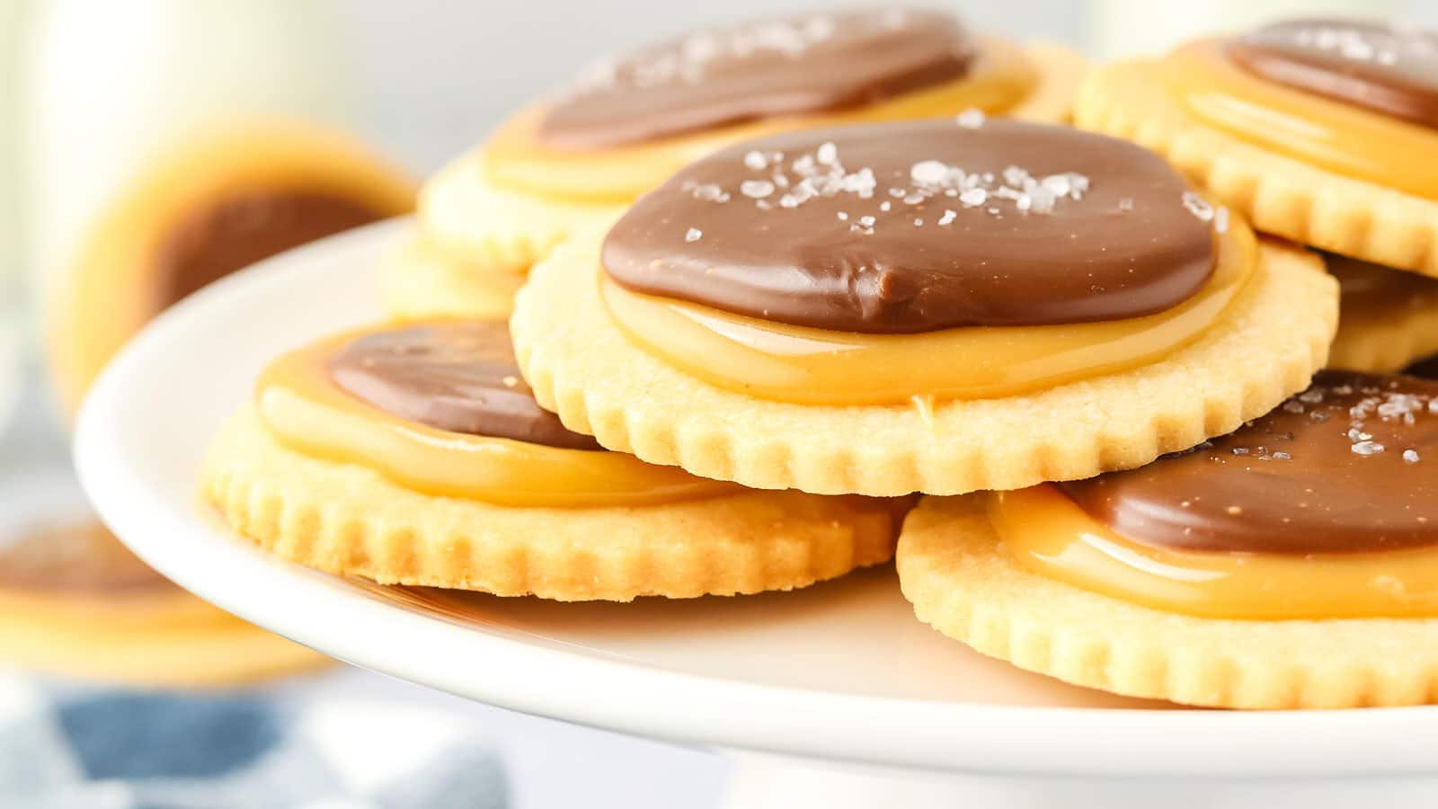 Closeup of Twix Cookies served on a white plate.