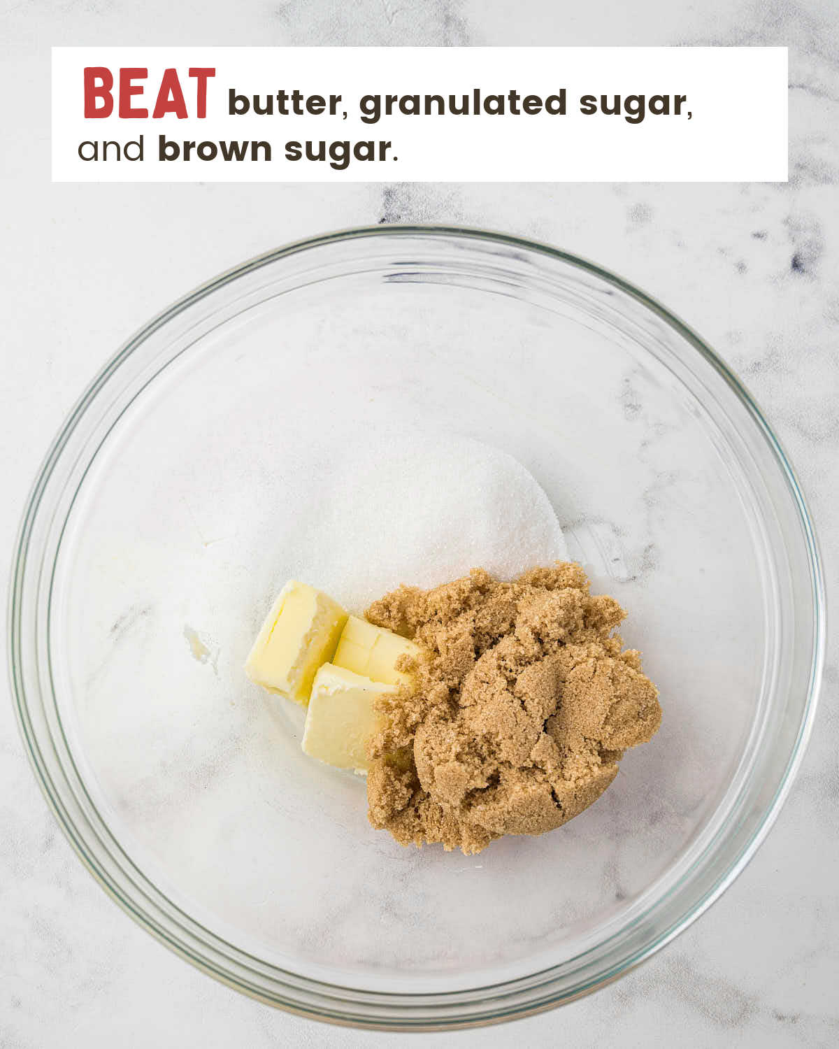 Granulated and brown sugar and butter to be mixed in a large bowl.