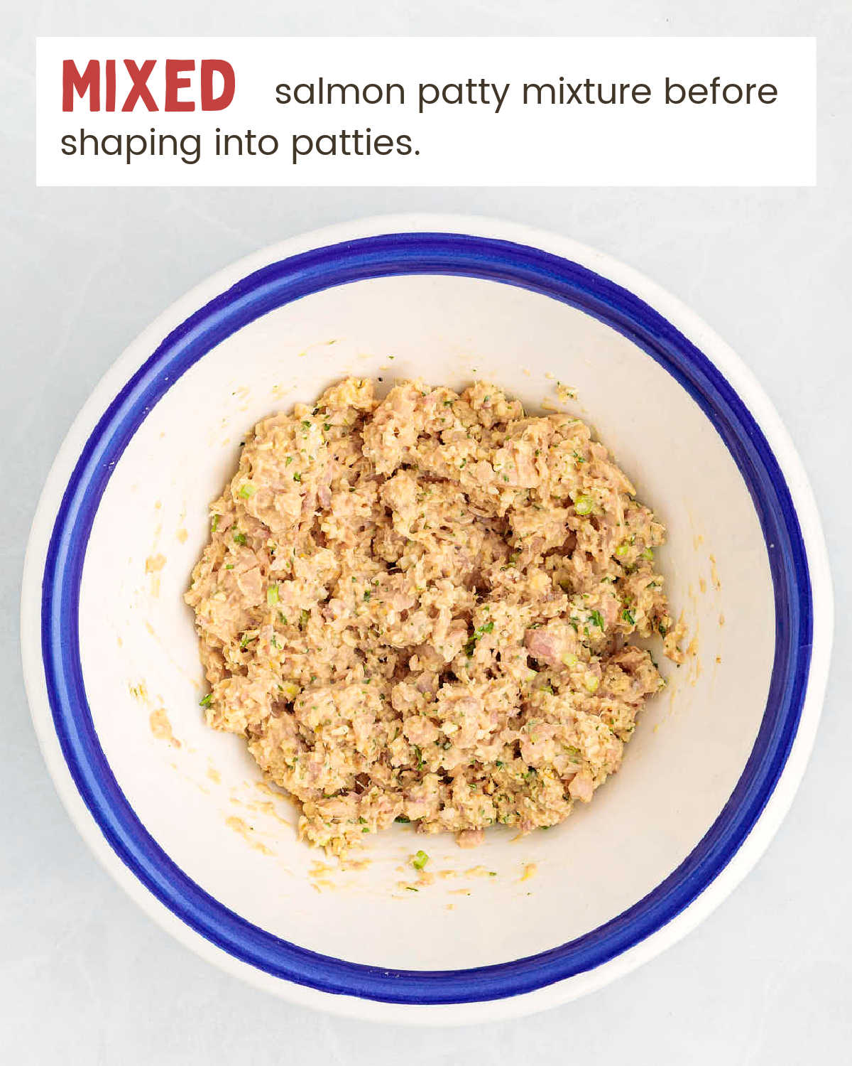 Canned salmon, eggs, mayonnaise, Dijon mustard, lemon zest, salt, and pepper in a mixing bowl.