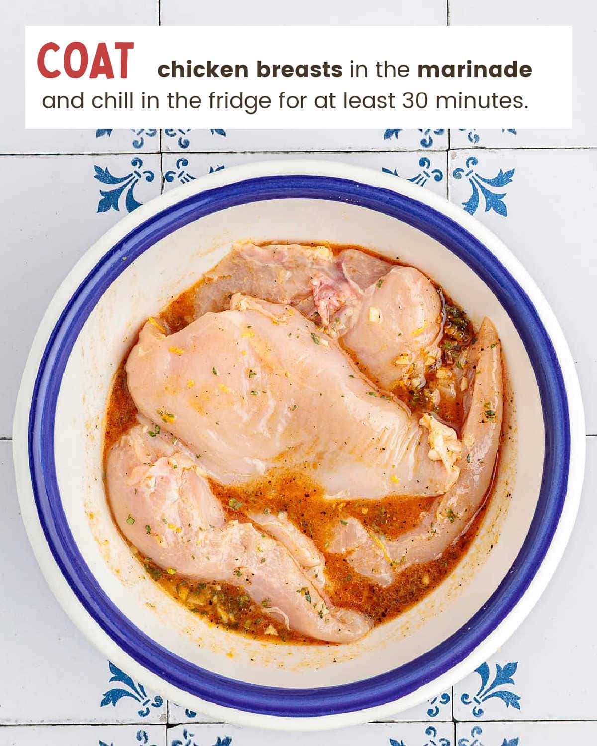 Chicken breast coated in marinade. 