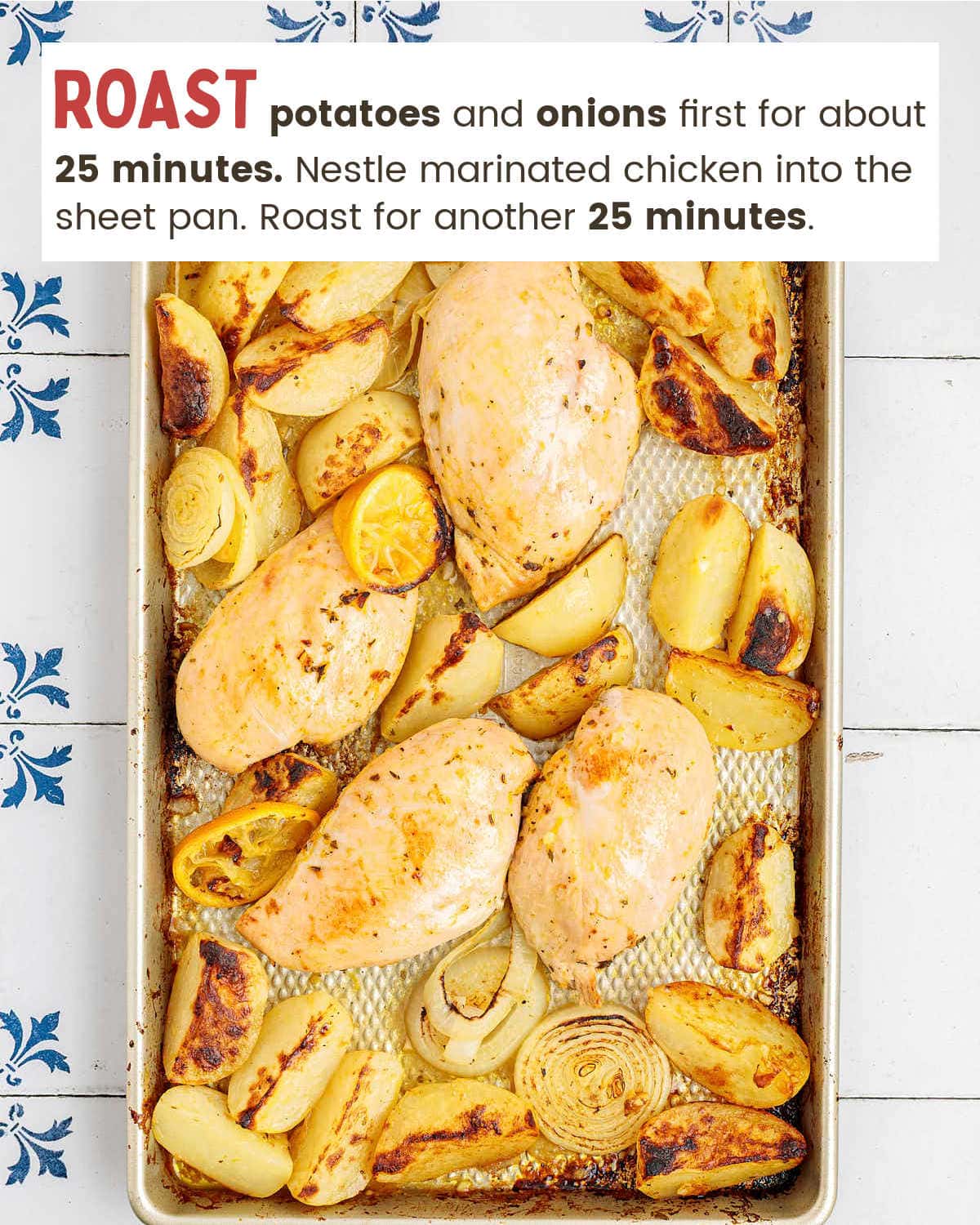 Roasted chicken, potatoes, onion, and lemon slices on a sheet pan. 