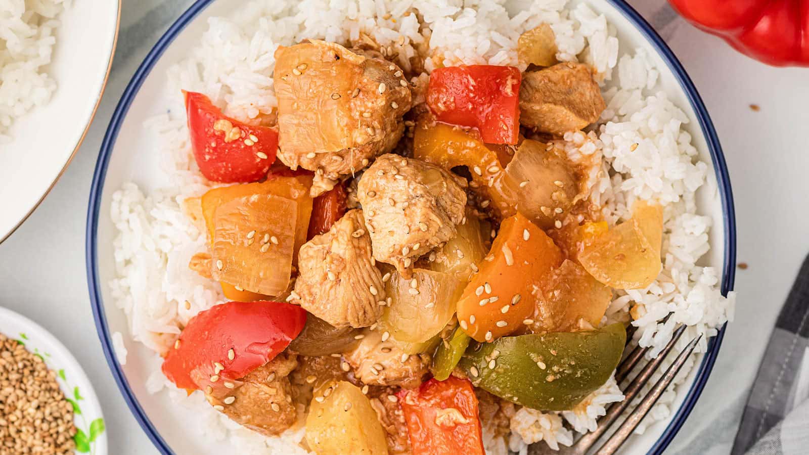 Crockpot Sweet and Sour Chicken served over white rice.