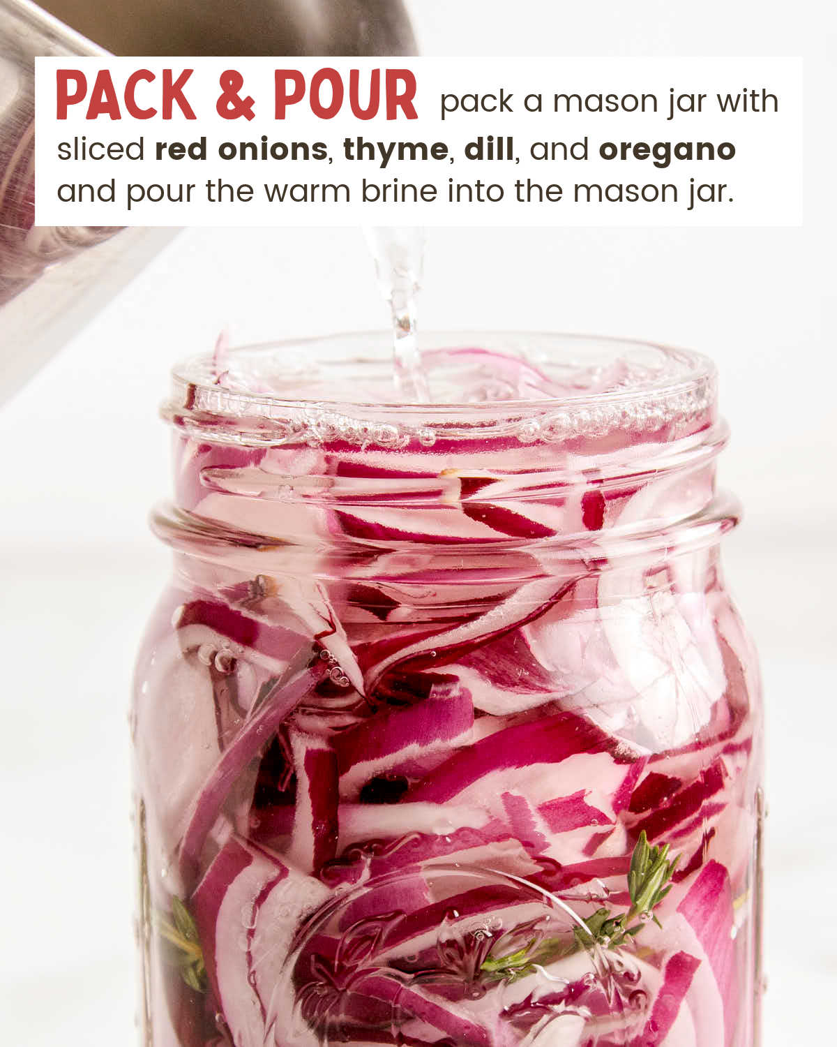 Warm brine poured over sliced red onions and fresh herbs for Pickled Red Onions.