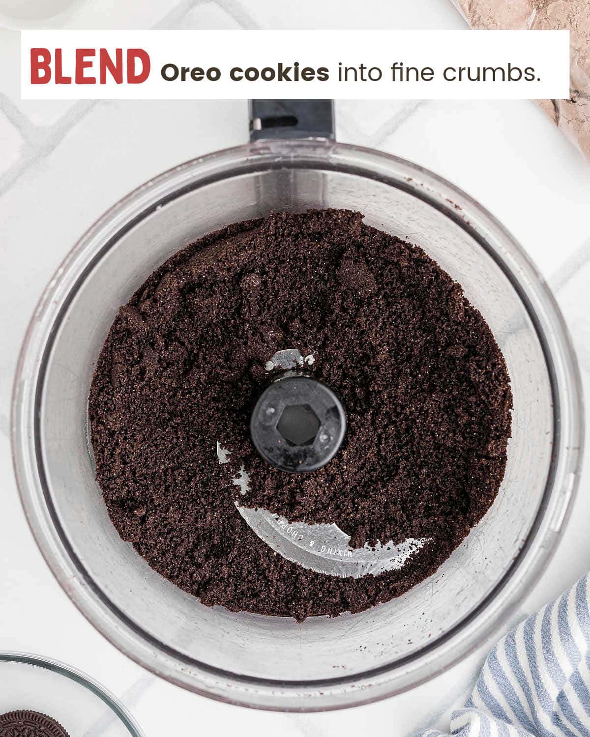 Oreo crumbs in a food processor for Mississippi Mud Pie crust.