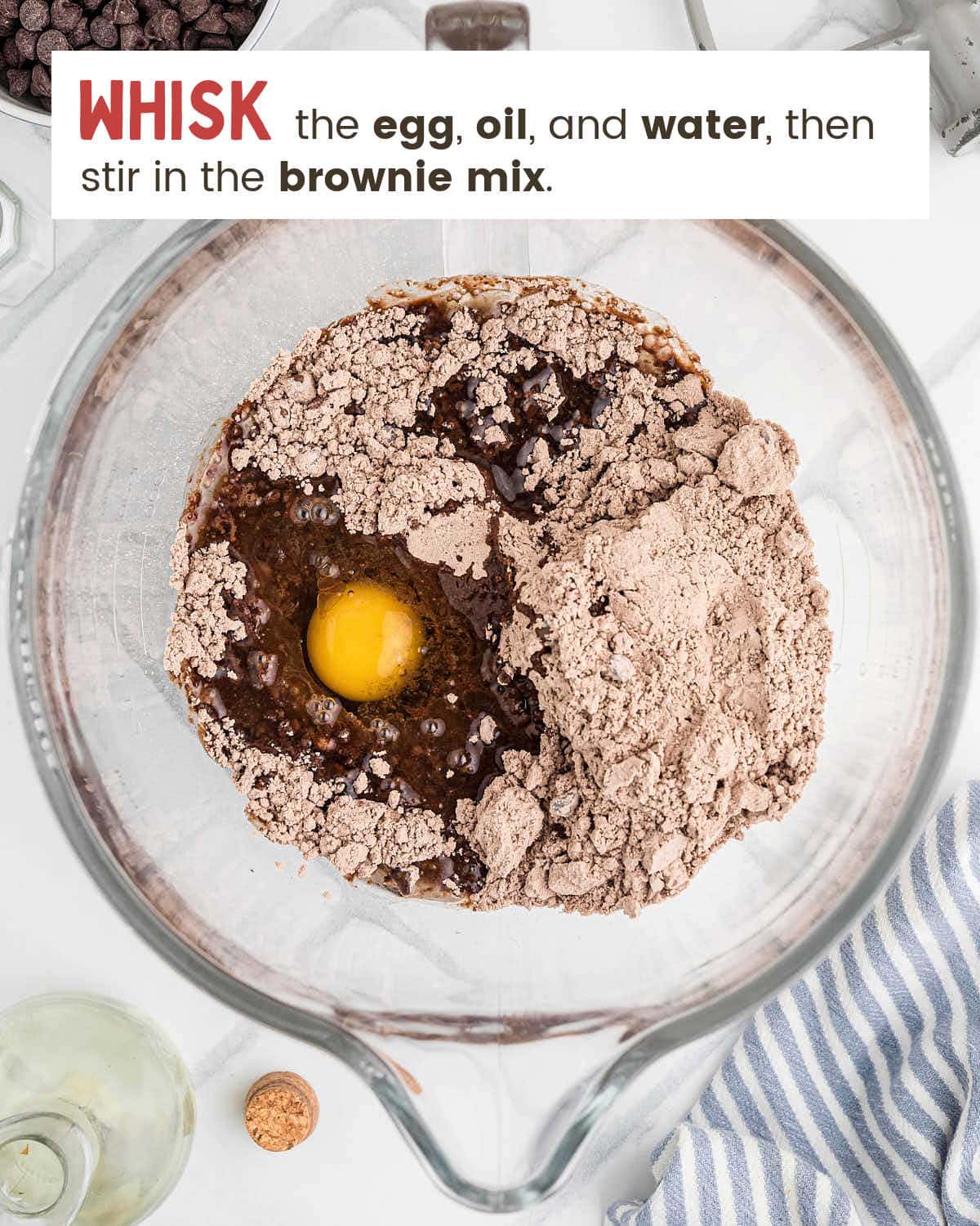 Brownie mix, egg, oil, and water in a mixing bowl for the Mississippi Mud Pie brownie layer.