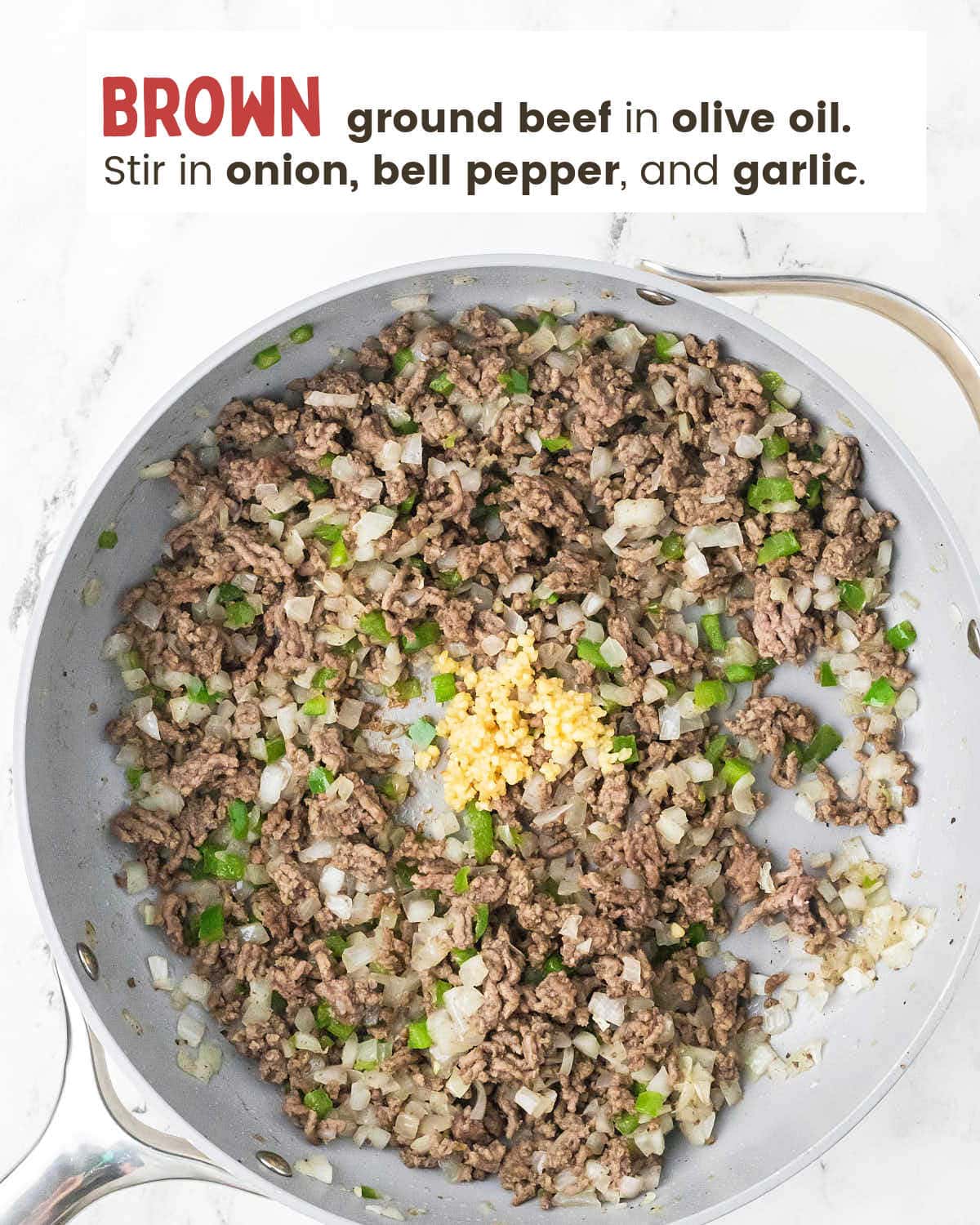 Browning the beef with onion, bell pepper, and garlic for Ground Beef and Potatoes.