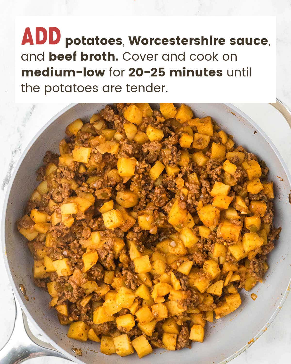 Fork tender potatoes and beef in the skillet after a covered simmer in broth.