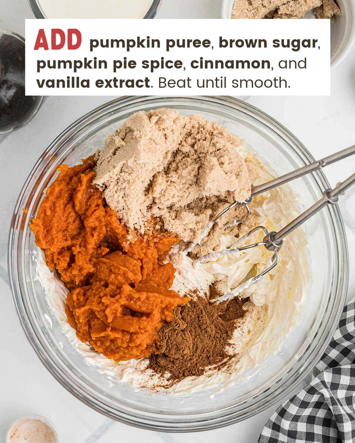 Pumpkin puree, brown sugar, and spices added to the whipped cream cheese.
