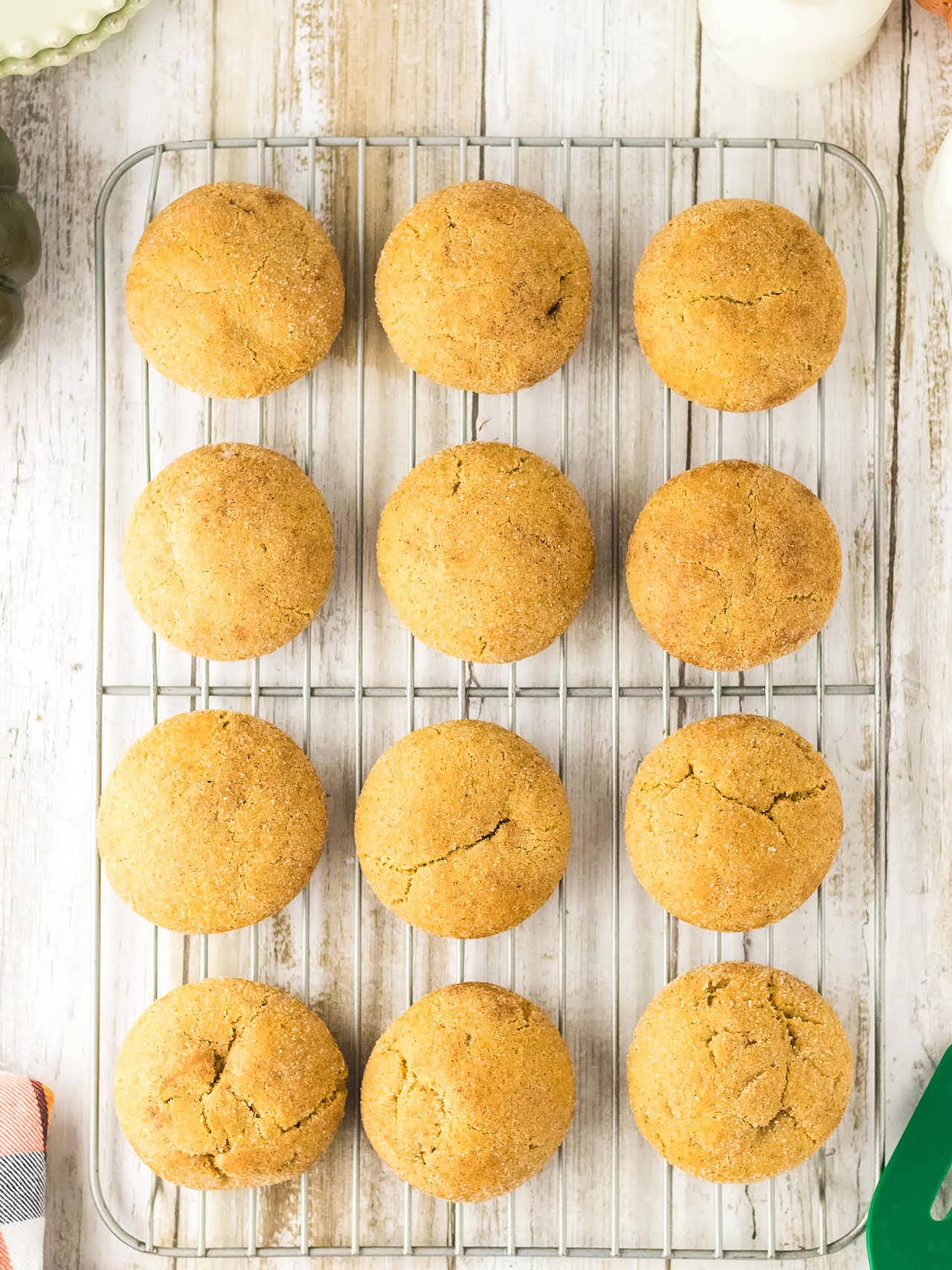 Pumpkin Cheesecake Cookies cooling on a wire rack.
