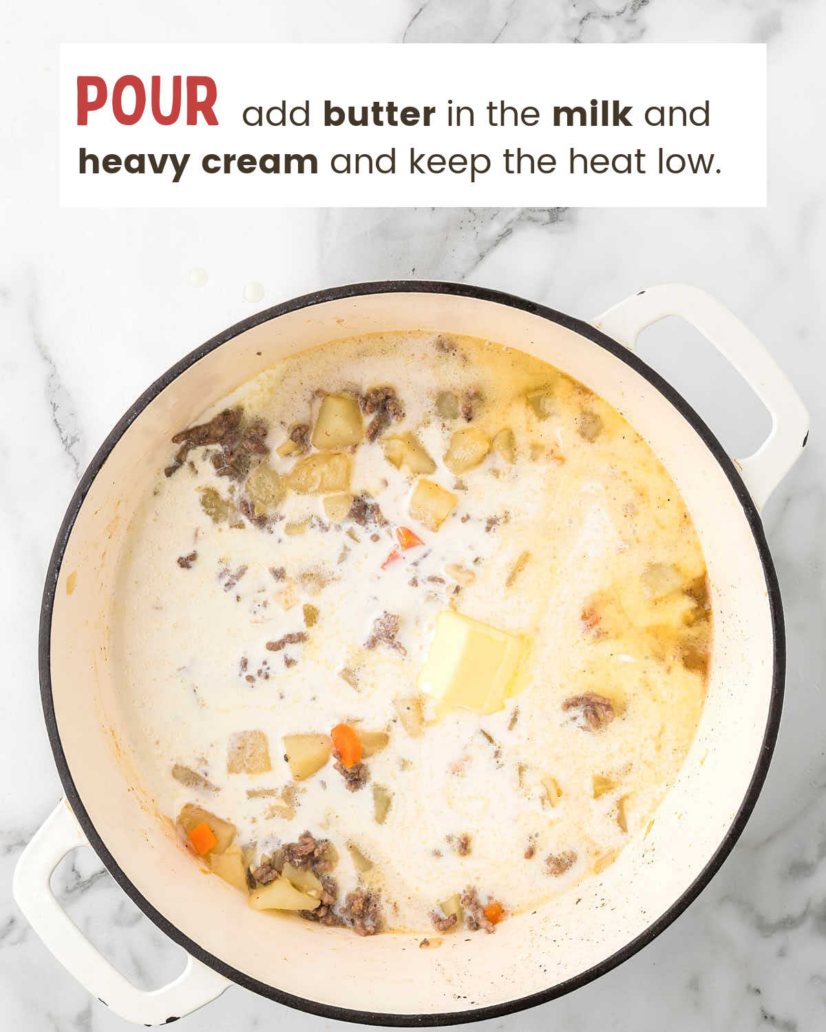 Milk and cream poured into the pot with the butter melting.