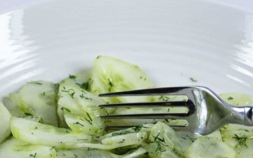 a bowl of authentic German Cucumber Salad