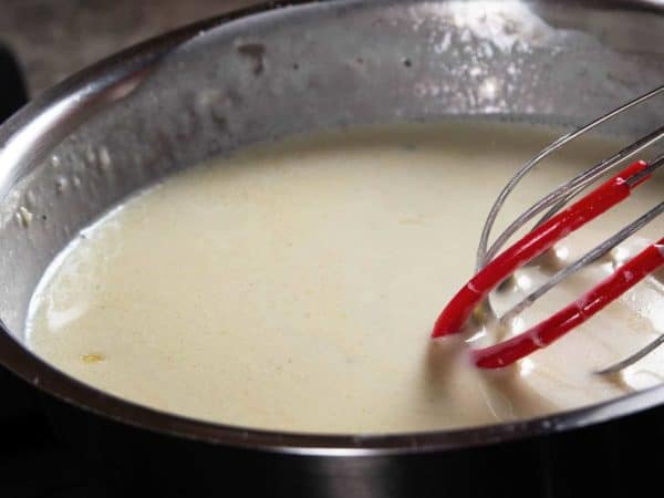 Whisking Alfredo Sauce
